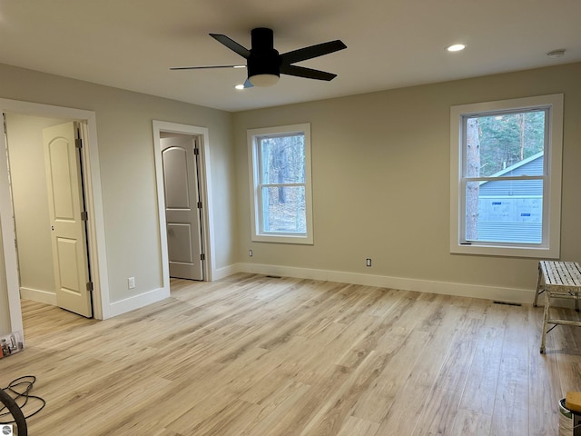 unfurnished bedroom with recessed lighting, visible vents, ceiling fan, light wood-type flooring, and baseboards