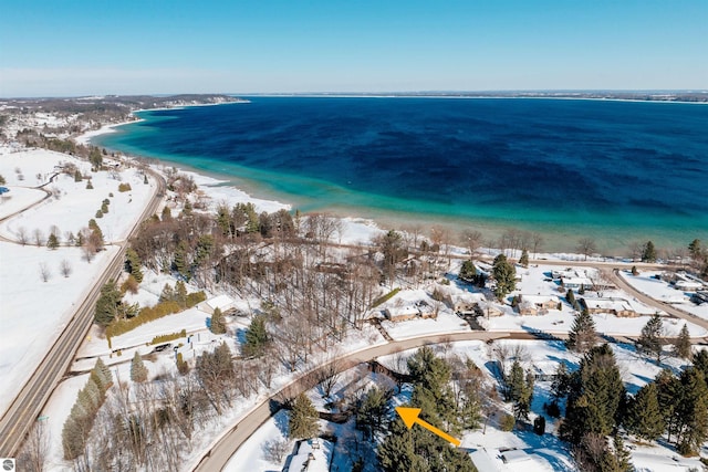 bird's eye view with a water view and a view of the beach