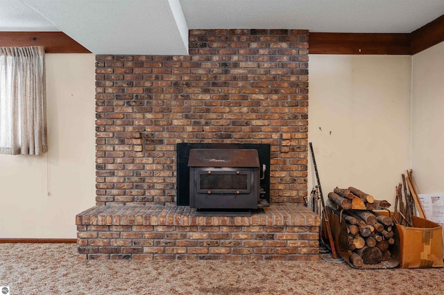 interior details featuring carpet and a wood stove