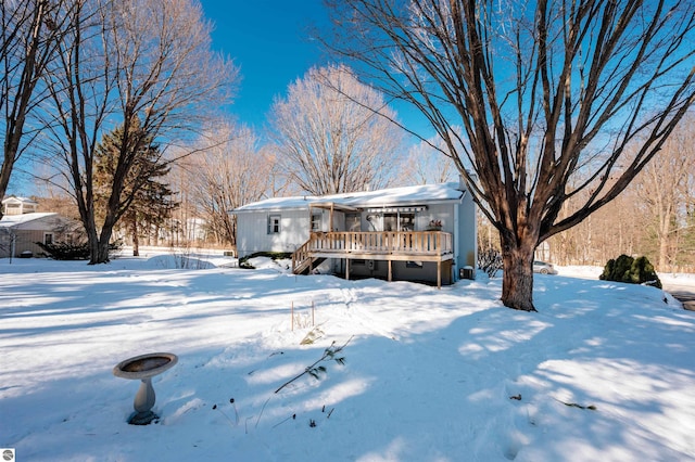 view of front of house featuring a deck