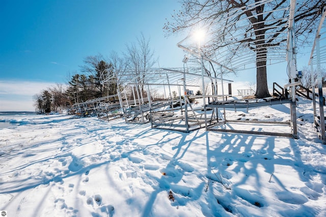 view of yard layered in snow