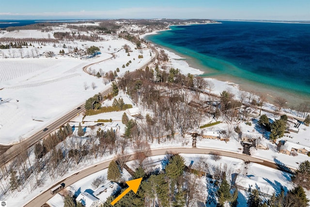 bird's eye view with a water view and a view of the beach