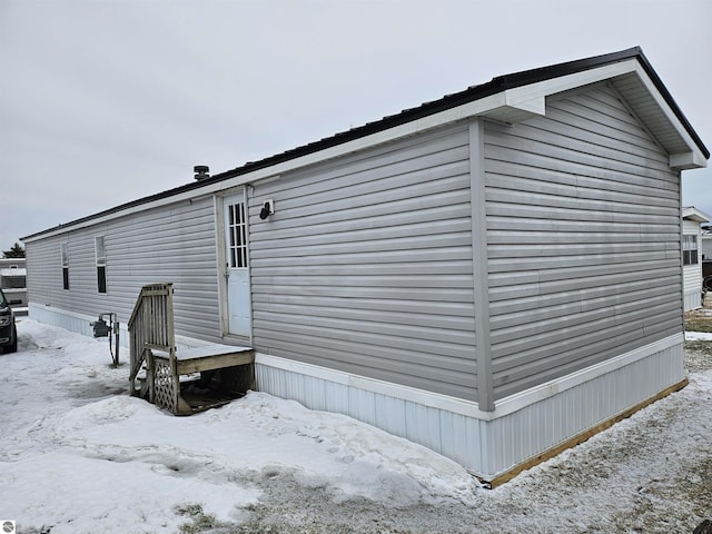 view of snow covered property