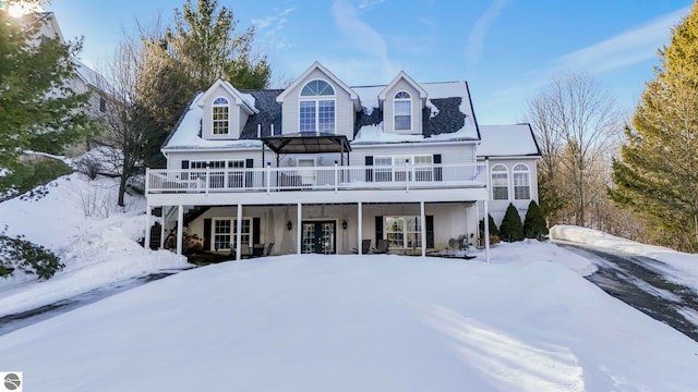 view of front of home with a wooden deck