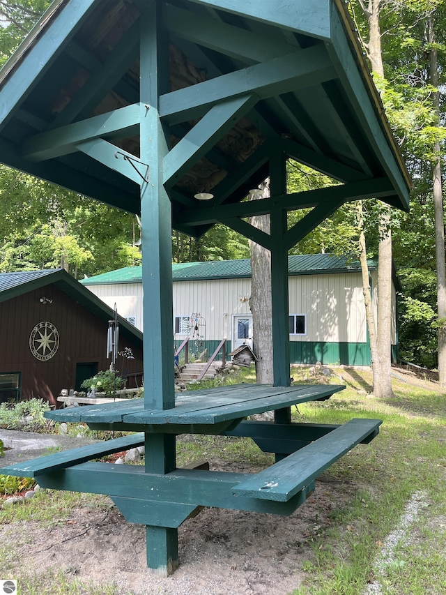 view of community featuring an outbuilding