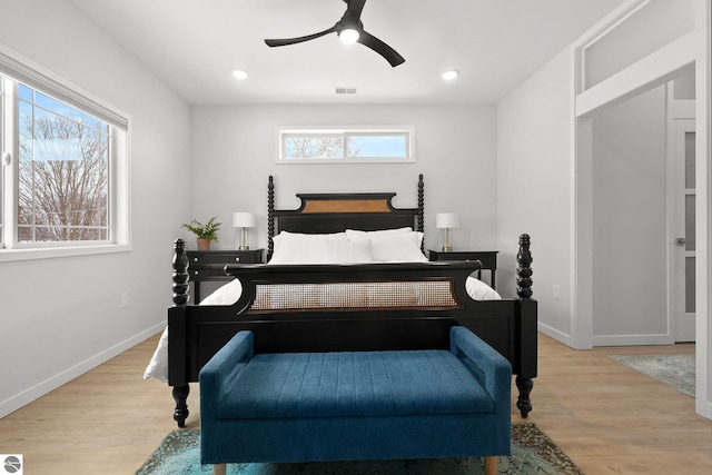 bedroom featuring recessed lighting, visible vents, light wood-style flooring, ceiling fan, and baseboards