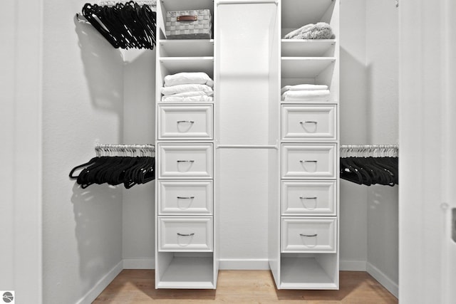 spacious closet with light wood-type flooring