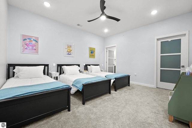 bedroom with recessed lighting, light carpet, and visible vents