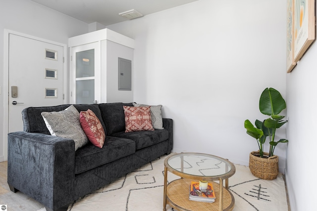 living room featuring electric panel