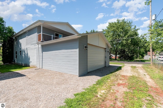 garage featuring driveway