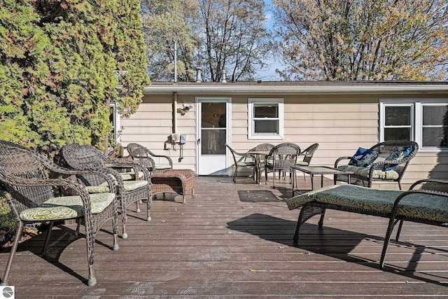 deck featuring outdoor lounge area