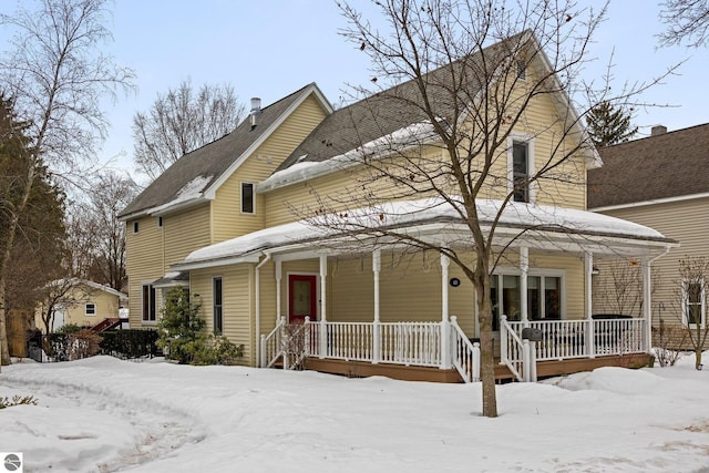 view of front of property featuring covered porch