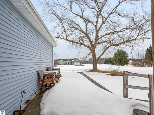 view of yard covered in snow