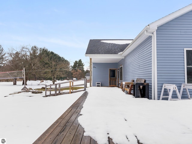 view of snow covered deck