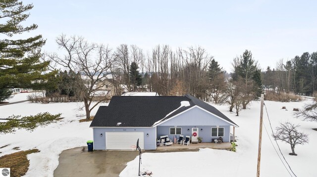view of front of home featuring driveway and an attached garage