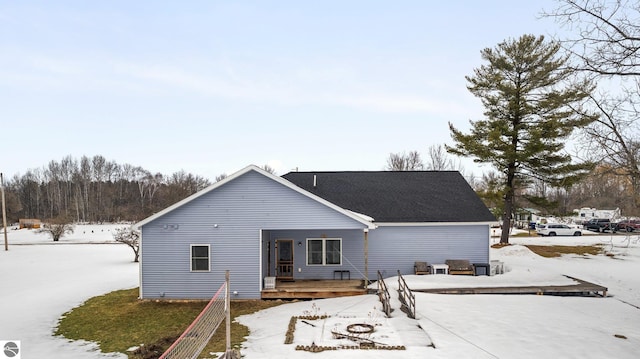 view of snow covered house