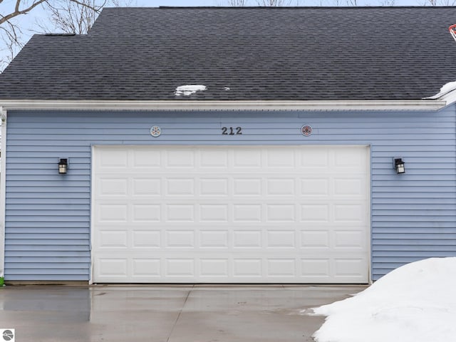 garage featuring driveway