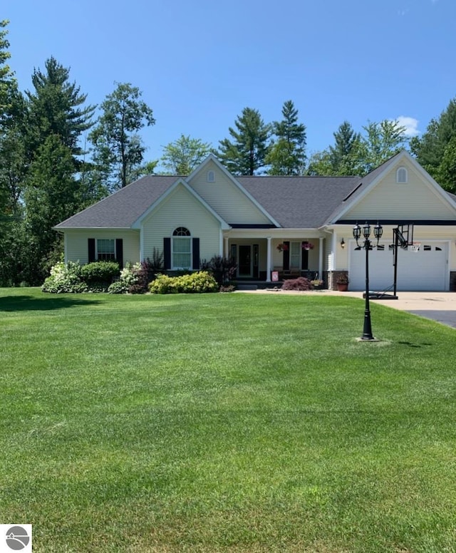 ranch-style house with an attached garage, driveway, and a front yard