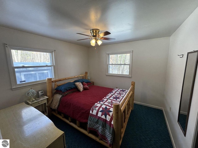 carpeted bedroom featuring a ceiling fan and baseboards