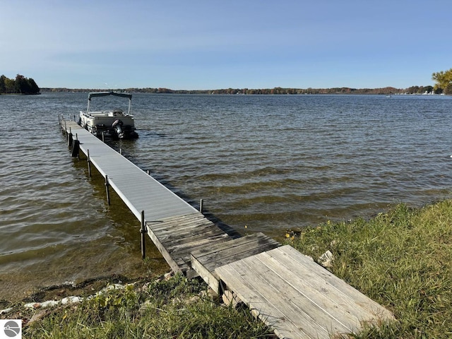 view of dock with a water view