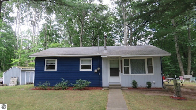 view of front of home with a front yard