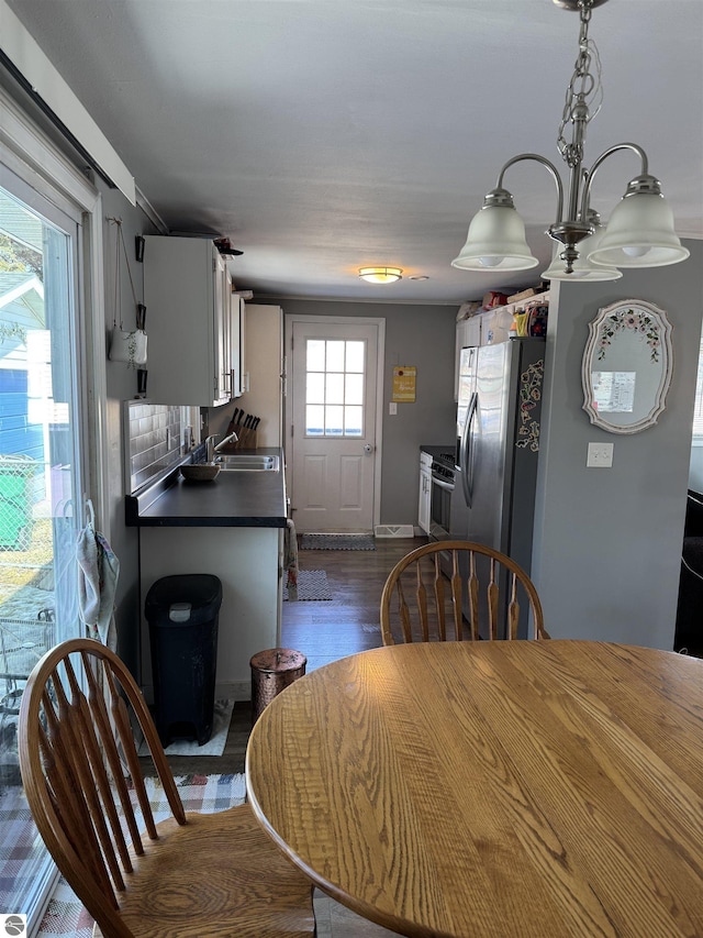 dining room featuring dark wood finished floors