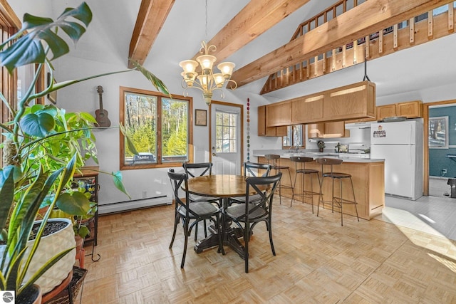 dining space with a baseboard radiator, a chandelier, and beamed ceiling