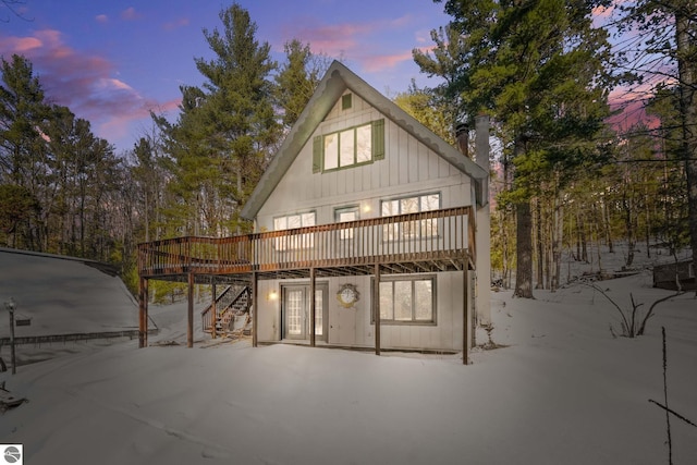 exterior space with a deck and stairway