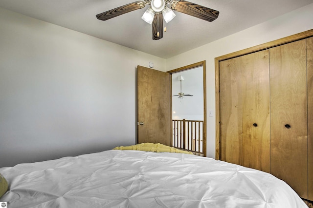 bedroom with a closet and a ceiling fan