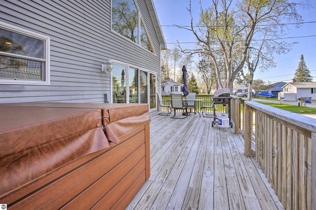 wooden terrace featuring outdoor dining space