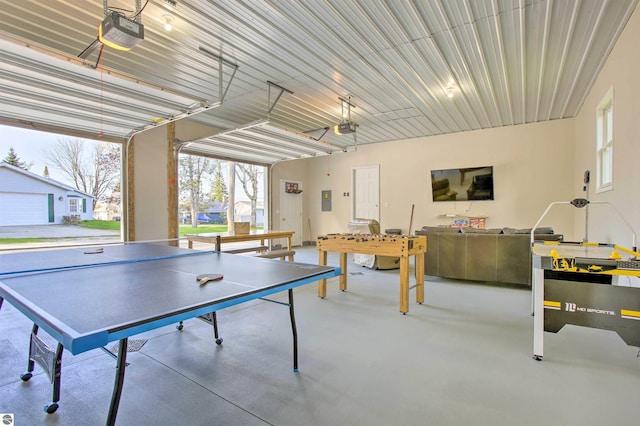 playroom with a garage and concrete flooring