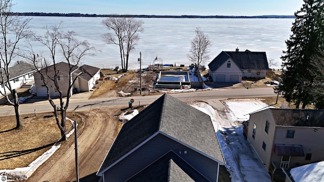 exterior space with a water view