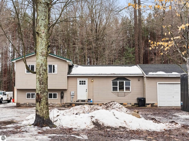 tri-level home featuring a garage