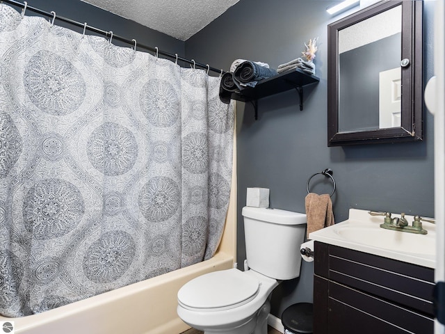 bathroom with shower / bath combo, a textured ceiling, toilet, and vanity