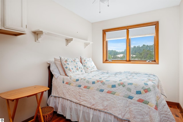 bedroom featuring wood finished floors