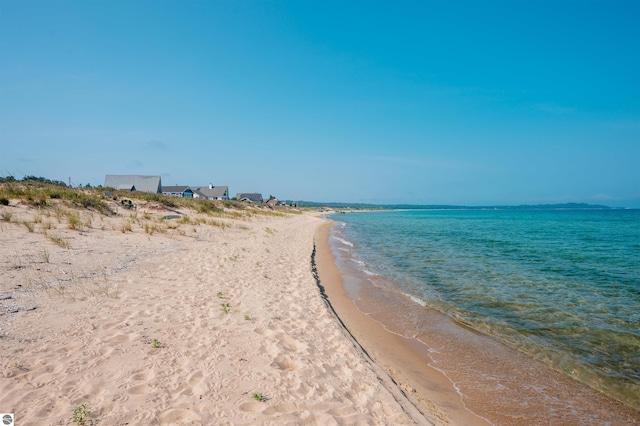 view of water feature with a beach view