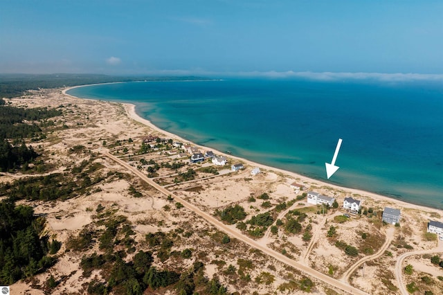 aerial view featuring a beach view and a water view