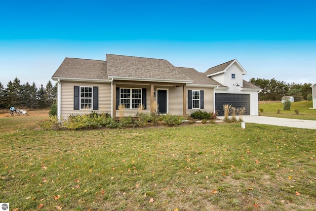 view of front of property featuring concrete driveway, a front yard, and a shingled roof