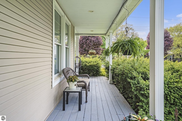 deck featuring covered porch