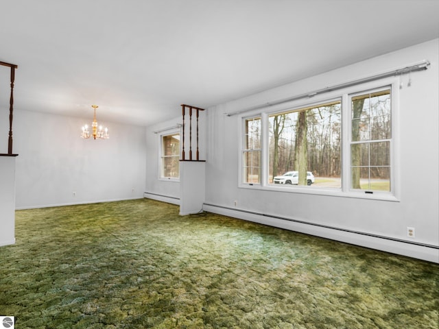 unfurnished living room featuring a notable chandelier, a baseboard heating unit, baseboards, and carpet floors