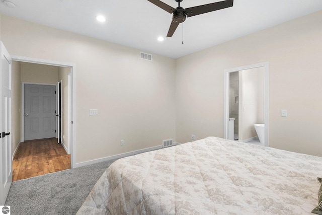 bedroom with recessed lighting, visible vents, carpet, and ensuite bath