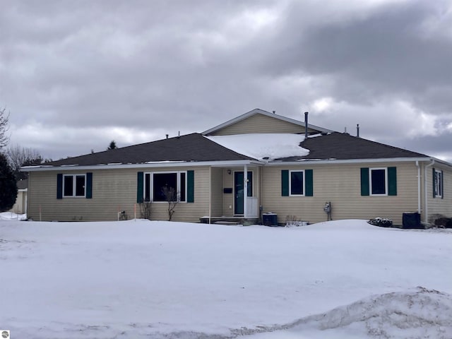 view of front of house featuring cooling unit