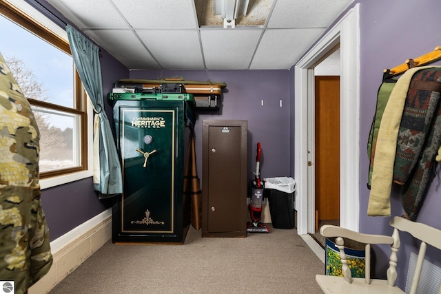 game room featuring a drop ceiling and carpet
