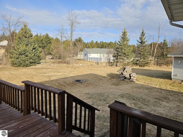 view of yard featuring a wooden deck