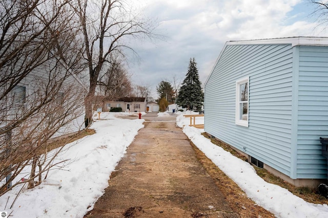 view of road with driveway