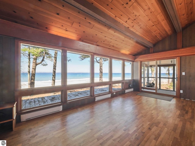 unfurnished sunroom featuring wooden ceiling, vaulted ceiling with beams, a water view, and a baseboard radiator