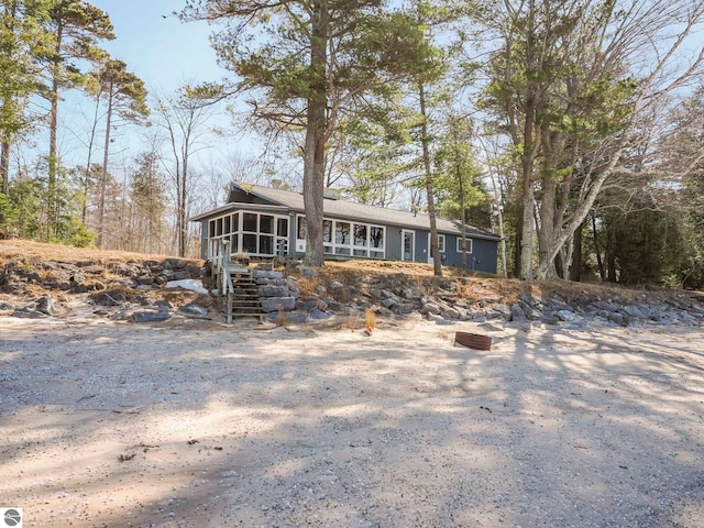 view of front of property with a sunroom