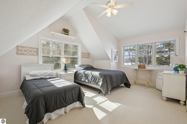 bedroom featuring ceiling fan, lofted ceiling, baseboards, and light carpet