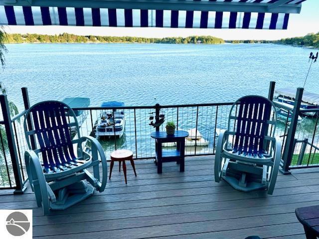 deck featuring a water view