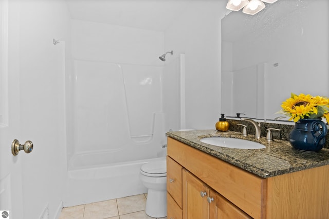 full bath featuring tile patterned floors, toilet, vanity, and bathtub / shower combination